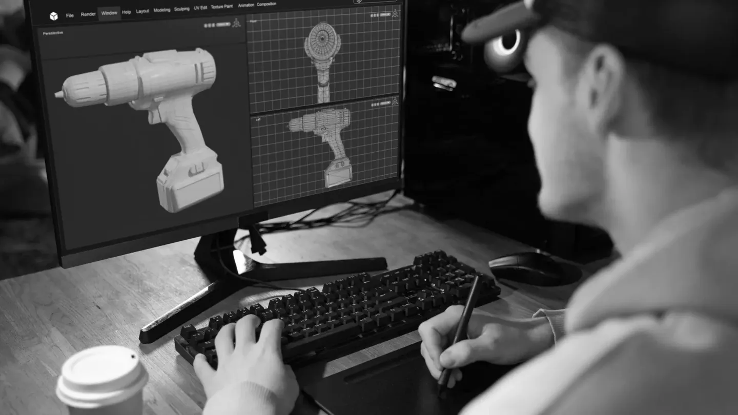 A designer working on 3D modeling of a product using professional design software
